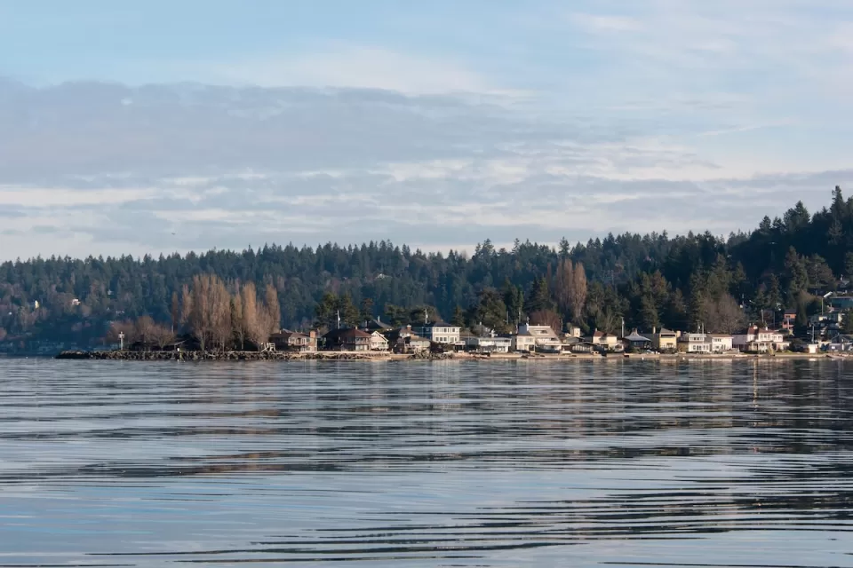 View across lake of small town of Burien in Washington state.
